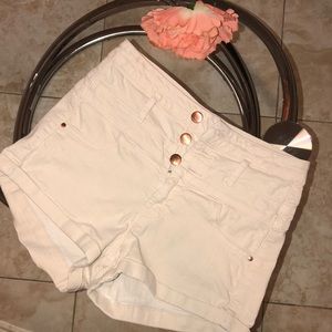 Creme shorts with gold stud buttons